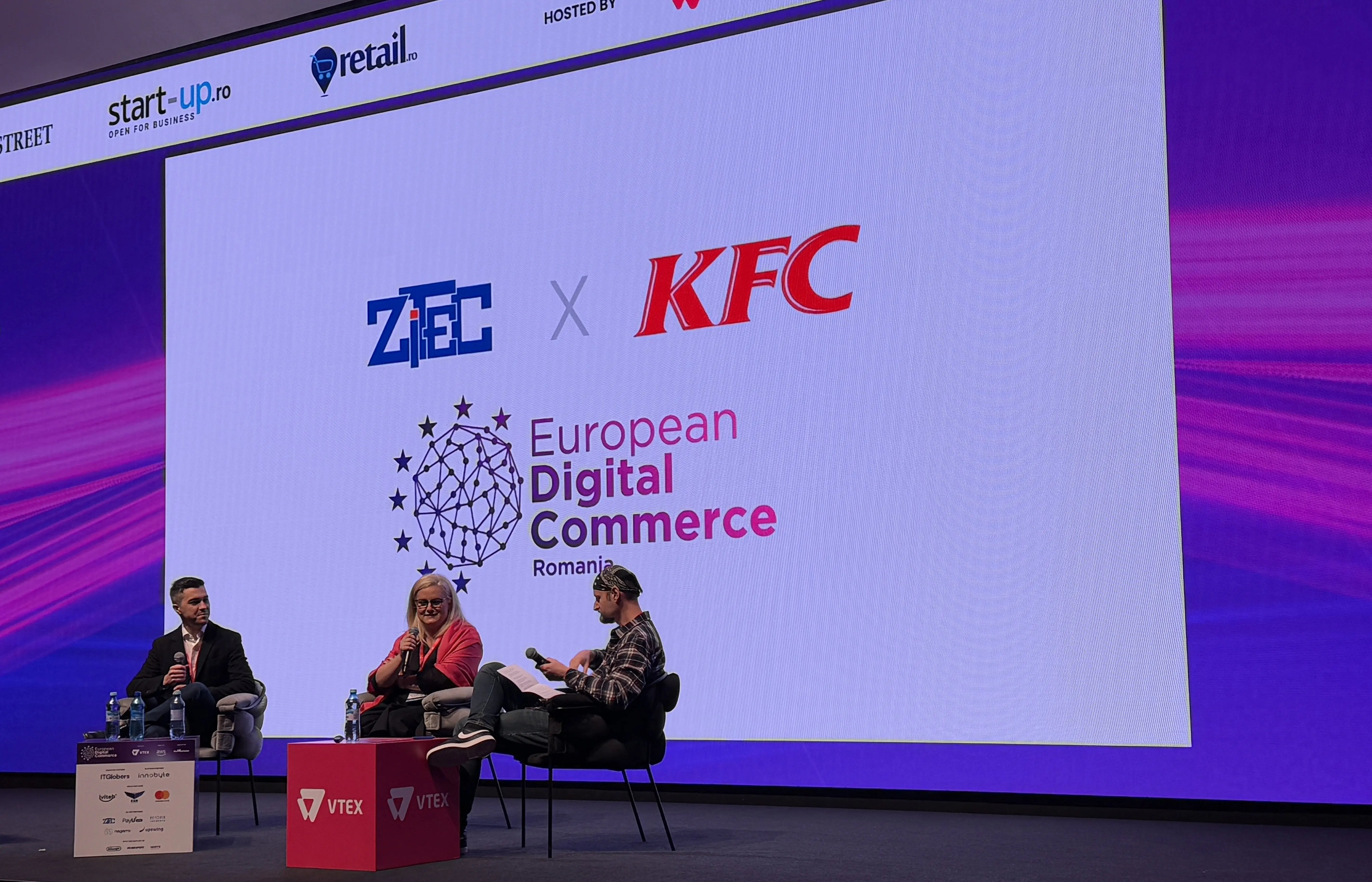 Zitec and KFC representatives sharing a panel discussion